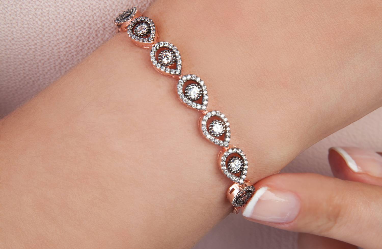 A crystal bracelet on a wrist