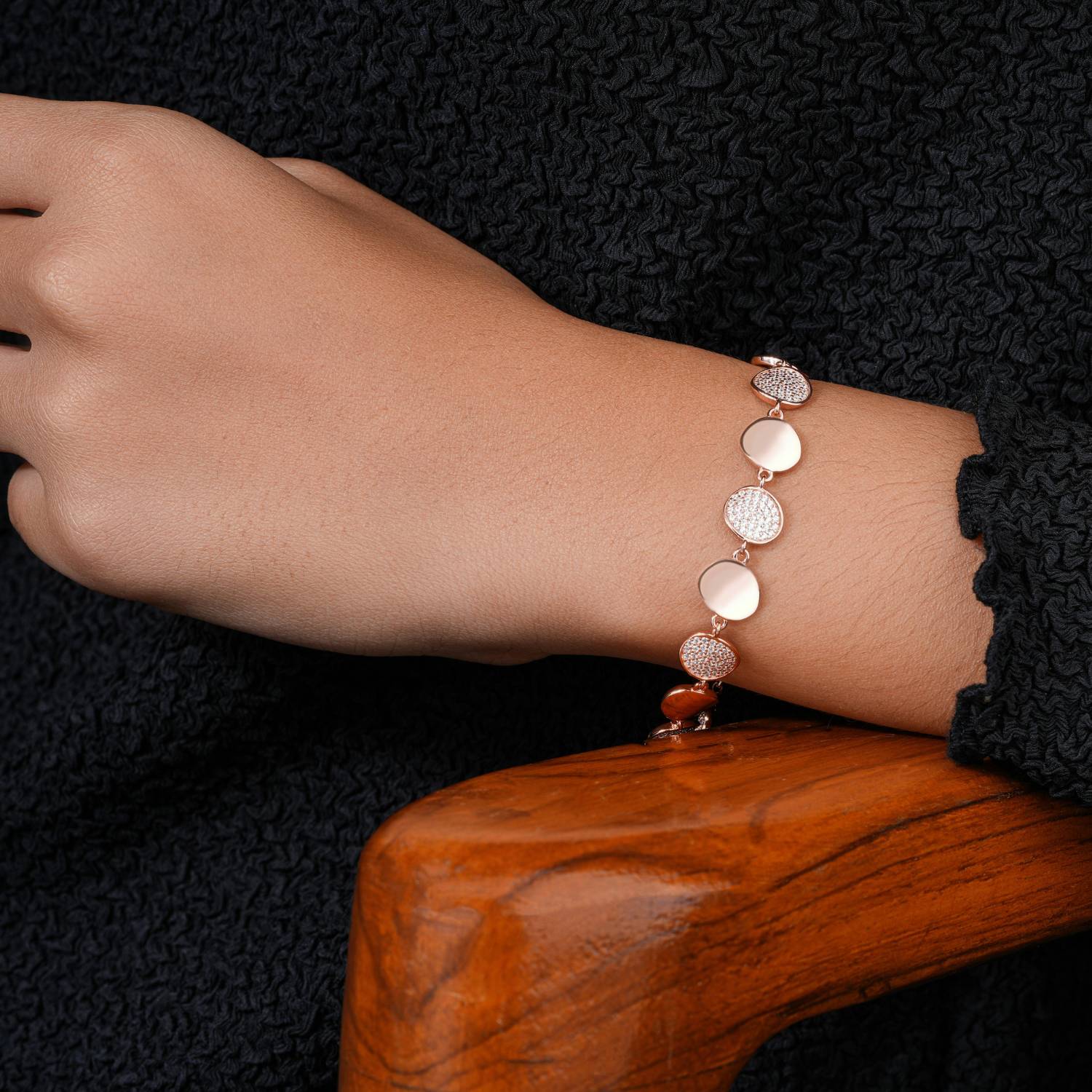 A disc bracelet on a wrist